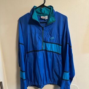 Nike Blue Windbreaker Retro Athletic Style